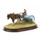 Border Fine Arts loose raking sculpture of a work horse by Ray Ayres, with wood stand, limited