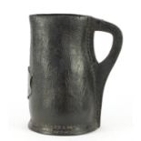 Large 17th century leather Black Jack jug with pewter cartouche engraved AF and dated 1671, 23.5cm