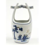 Chinese porcelain basket decorated with figures in a landscape, 32cm high :For Further Condition