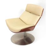 Contemporary bentwood and leather swivel lounge chair, 92cm high :For Further Condition Reports