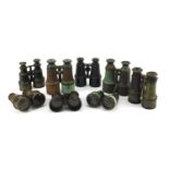 Eight pairs of military interest binoculars including examples by Negretti & Zambra, W Gregory &