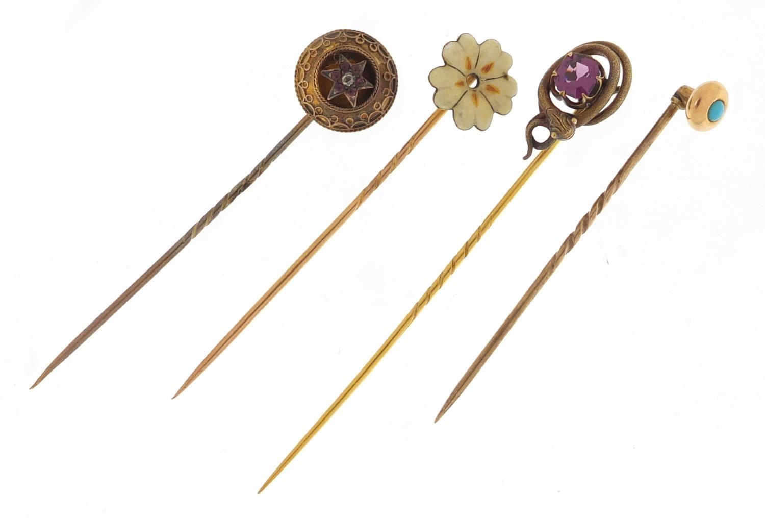 Four Victorian unmarked gold and gilt metal tie pins including a serpent and one set with a - Image 2 of 3