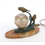 French Art Deco bird design lamp with globular glass shade, raised on a marble base, 21cm high :