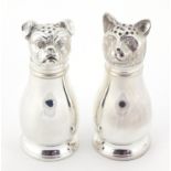 Novelty silver plated salt and pepper cellars in the form of a cat and dog, each 11cm high :For