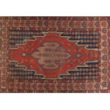 Rectangular Persian Mazlagan rug having an all over flower head design and central medallion onto