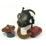 British military World War II gas mask and a child's Mickey Mouse example :For Further Condition