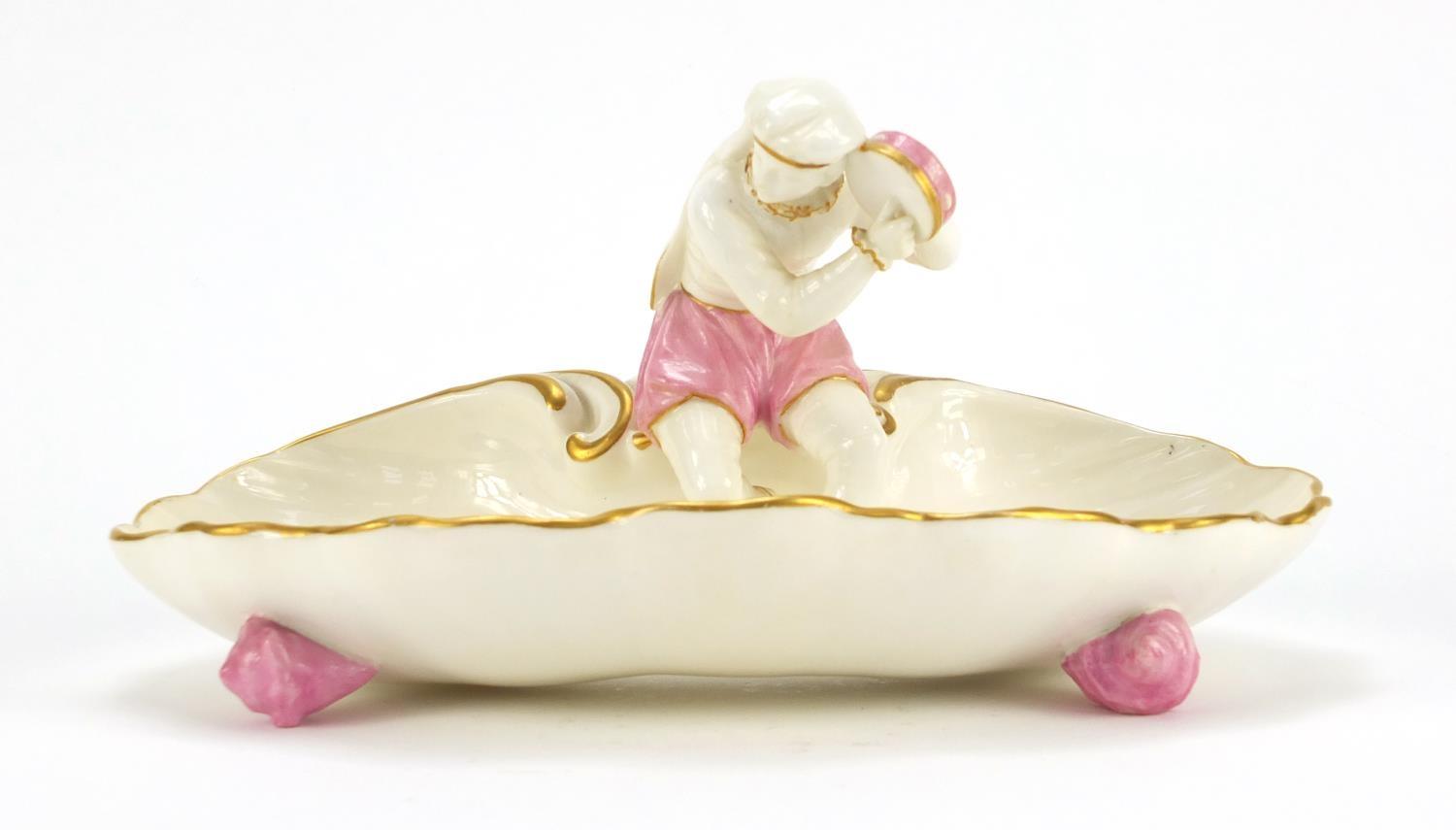 Victorian Worcester figural shell sweetmeat dish mounted with a girl holding a tambourine, 21.5 wide