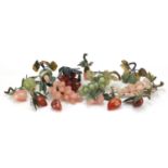 Collection of Chinese jade, agate and hardstone fruit including grapes, apple and peaches, the