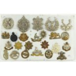 British military World War I and later cap badges including The King's Own, Royal Warwickshire,