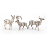 Three miniature silver animals including a long horn goat, the largest 5.5cm high, 113.0g :For