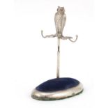 Edward VII novelty silver pin cushion in the form of an owl seated on a branch, with garnet eyes, by