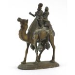 African Benin style bronzed group of two figures on camel back, 31cm high :For Further Condition