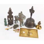 Wooden and metalware including a tribal wood carving, engraved gilt metal lock plate, silver spoon