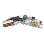 Objects including Mdina glass paperweight, shell purse, magnifying glasses, British coinage,