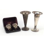 Two silver bud vases and a pair of Turkish silver egg cups, housed in a Hamilton & Inches box, the