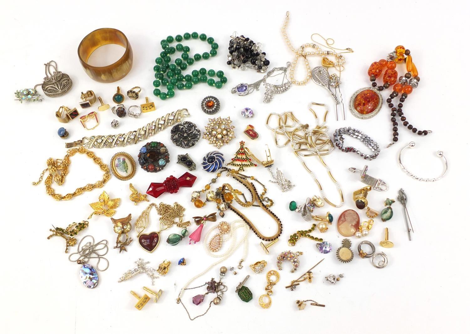Vintage and later jewellery including brooches, necklaces, bracelets and cuff links :For Further