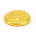 Chinese gold coloured metal scroll weight, impressed character marks, 6cm in diameter :For Further