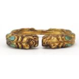 Tibetan gilt metal dragon bangle set with turquoise and coral, 8cm in diameter :For Further