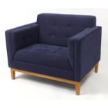 Contemporary lounge chair by Frovi with blue buttonback upholstery, 83cm H x 105cm W x 77cm D :For