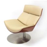 Contemporary bentwood and leather swivel lounge chair, 92cm high :For Further Condition Reports