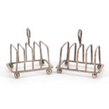 Two silver four slice toast racks, one by Brook & Son, Edinburgh 1918, each 7.5cm wide, 88.9g :For