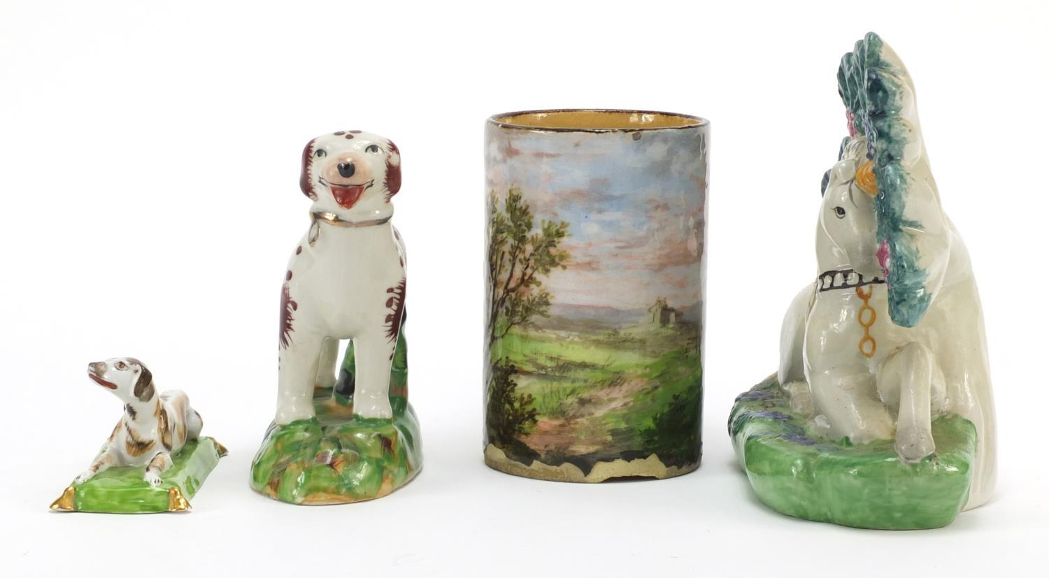 Three Staffordshire style animals and a cylindrical pot hand painted with a fisherman, the largest - Image 3 of 8