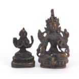 Two Chino-Tibetan bronze Buddhas, the largest 8cm high :For Further Condition Reports Please Visit