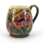 William Moorcroft miniature jug hand painted in the Revived Cornflower pattern, 5.3cm high :For