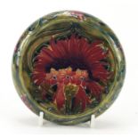 William Moorcroft dish hand painted in the Revived Cornflower pattern, 11cm in diameter :For Further