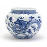 Chinese blue and white porcelain jar, hand painted with two dragons amongst clouds within ruyi