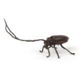 Japanese patinated bronze locust with articulated antennae, wings and legs, 12cm in length :For