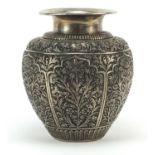 Indian silver coloured metal vase embossed and engraved with panels of flowers, 17.5cm high :For