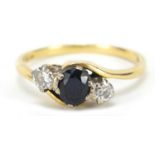 18ct gold diamond and sapphire crossover ring, hallmarked London 1968, size Q, 3.4g :For Further