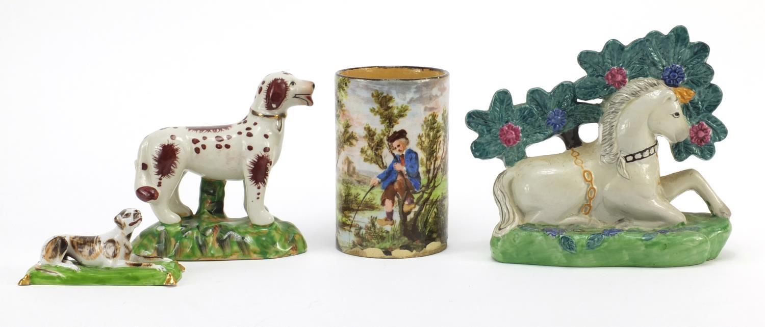 Three Staffordshire style animals and a cylindrical pot hand painted with a fisherman, the largest - Image 2 of 8