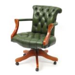 Swivelling Captains chair with green leather button back upholstery, 86cm high :For Further