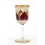 Bohemian red flashed glass goblet gilded with foliage, 20.5cm high :For Further Condition Reports