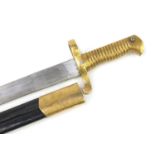 US military interest sabre bayonet with scabbard, 66.5cm in length :For Further Condition Reports