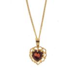 9ct gold garnet love heart pendant, 1.5cm in length, on a 9ct gold necklace, 44cm in length, 2.3g :