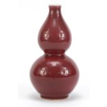 Chinese porcelain sang de boeuf glazed vase of double gourd form, 21.5cm high :For Further Condition