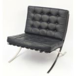 Chrome Barcelona chair with lift off cushions, designed by Ludwig Mies Van Der Rohe and Lilly Reich,