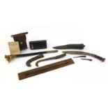 Sundry items comprising 19th century military leather scabbard, oak and brass rolling rule, Kukri