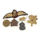 British and German militaria including RAF cloth patch, silver ARP lapel and the Buffs cap badge :