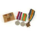 British military World War I and World War II three medal group with a box of issue including a Mons