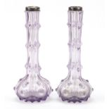 Pair of Victorian silver topped mauve glass vases, each 21cm high : For Condition Reports Please