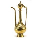 Islamic brass water pot with writhen body, 49.5cm high : For Condition Reports Please Visit Our