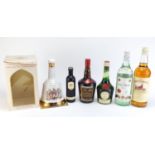 Six bottles of alcohol including 1L Famous Grouse whiskey, vintage 1L Bacardi and Bells Prince