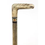 Antique Scrimshaw carved whalebone walking stick with bird head design handle, 93cm in length :