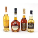 Two bottles of whiskey and two bottles of cognac comprising Glenmorangie Ten Year Old, Glen Moray,