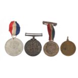 Three commemorative medallions and a World War 1 1914-18 war medal awarded to 74PTE.C.M.THOMAS.A.