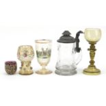 Continental glassware including a German goblet hand pained with a building, goblet hand painted